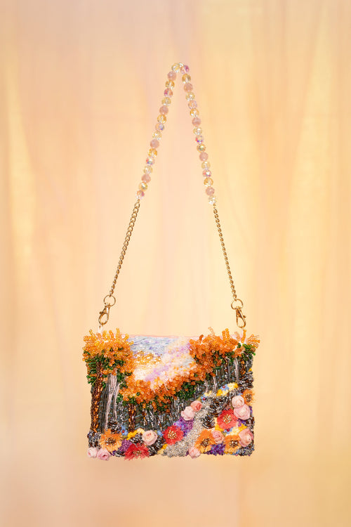 Hand-embroidered floral art bag with beaded handle and chain strap