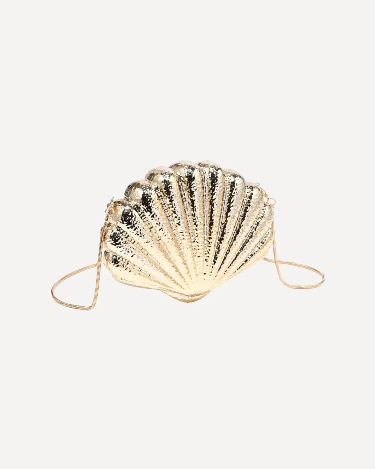 Hammered metallic shell-shaped evening clutch